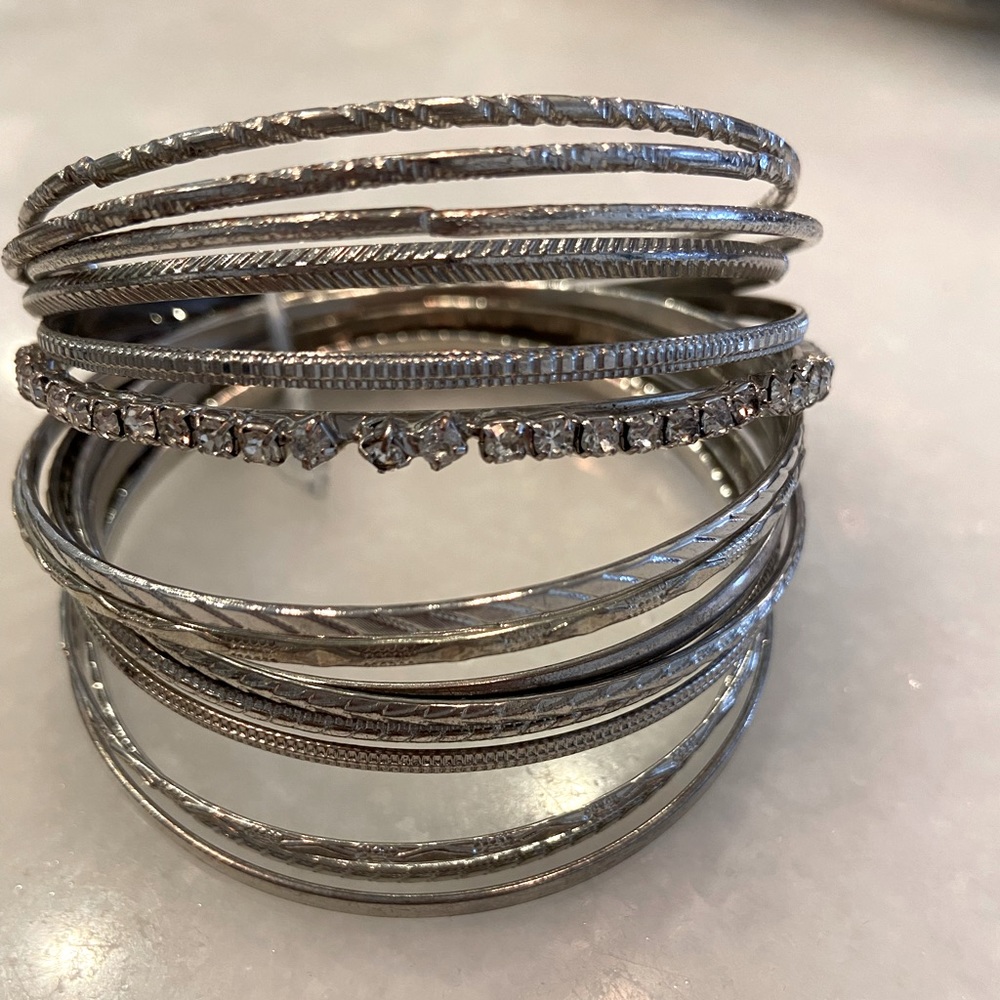 16 silver colored bangle bracelet set